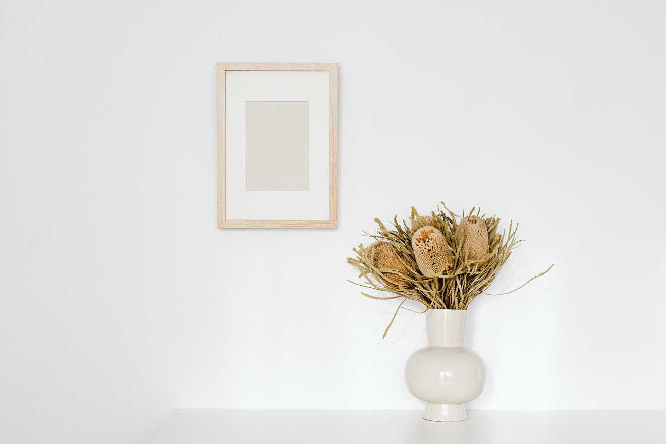 Dried Showy Banksia Flowers near the Hanging Wooden Frame 